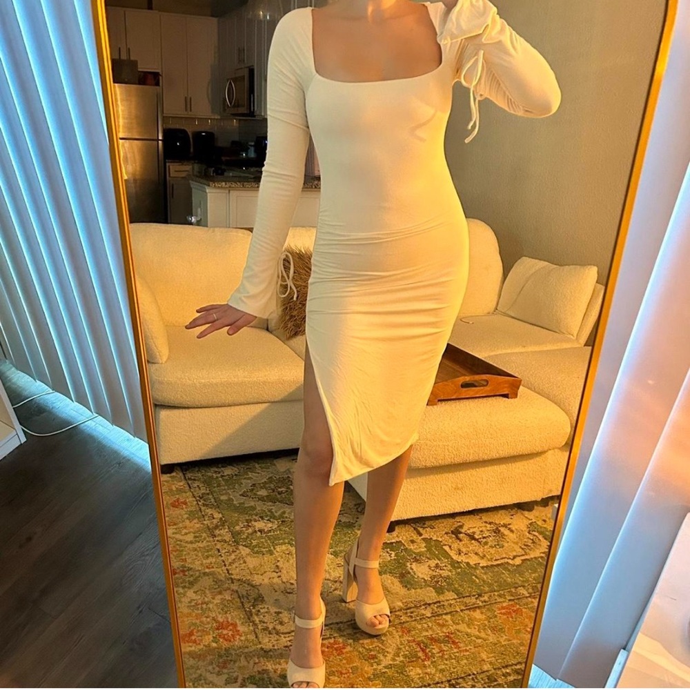 Oh Polly Sawyer square neck long sleeve high slit midi dress in ivory.
